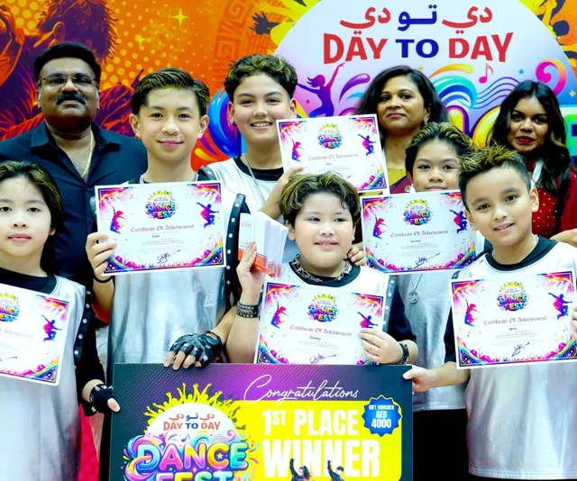 Day To Day Dance Fest first-place winners with certificates